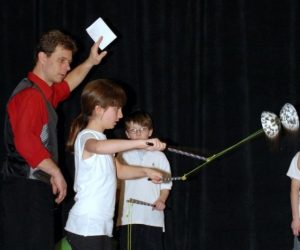 Larry teaching children
